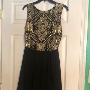 Black and gold design dress